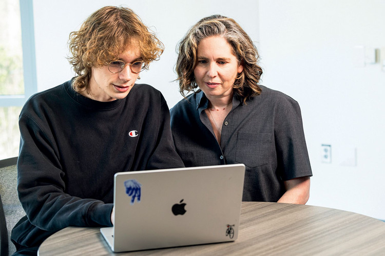 Klein with student